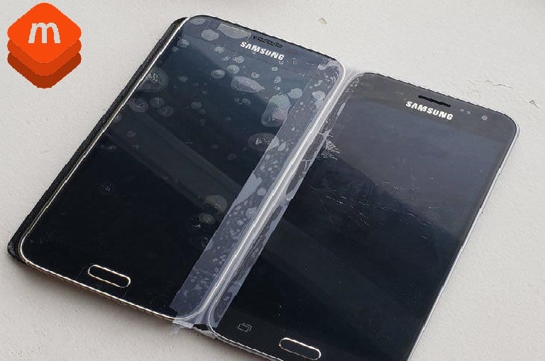 Samsung Galaxy Fold Phone reveal at Samsung Unpacked. Two Samsung S5 taped together to make Samsung Galaxy Fold